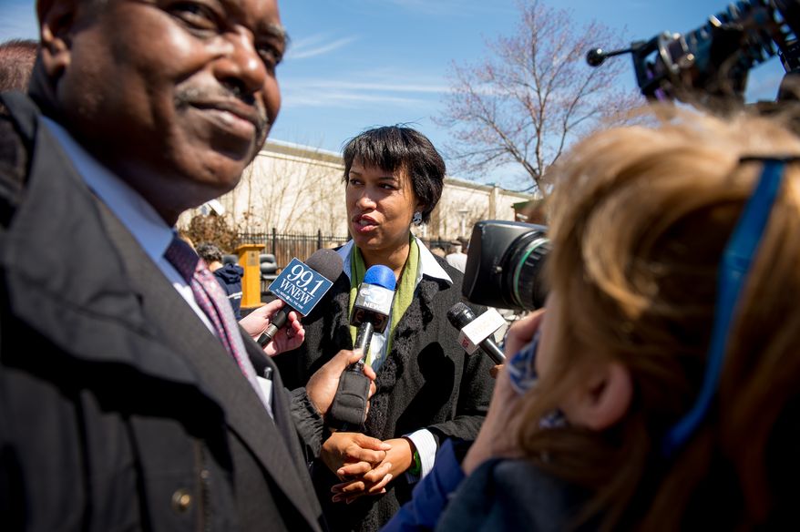 Mayoral candidate Councilmember Muriel Bowser (D-Ward 4) speaks to members of the media after attending a Washington Animal Rescue League 100th Anniversary Celebration, Washington, D.C., Monday, March 31, 2014. (Andrew Harnik/The Washington Times)