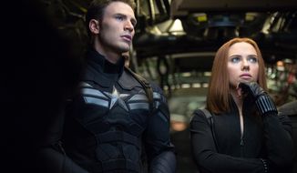 This image released by Marvel shows Chris Evans, left, and Scarlett Johansson in a scene from &amp;quot;Captain America: The Winter Soldier.&amp;quot; (AP Photo/Marvel-Disney)