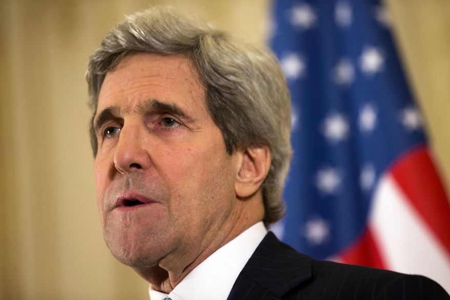 In this March 30, 2014, photo U.S. Secretary of State John Kerry speaks at a news conference in Paris. The United States is talking with Israel about the possibility of releasing convicted spy Jonathan Pollard early from his life sentence as an incentive in the troubled Mideast peace negotiations, a person familiar with the situation said Monday March 31, 2014. (AP Photo/Jacquelyn Martin, Pool)