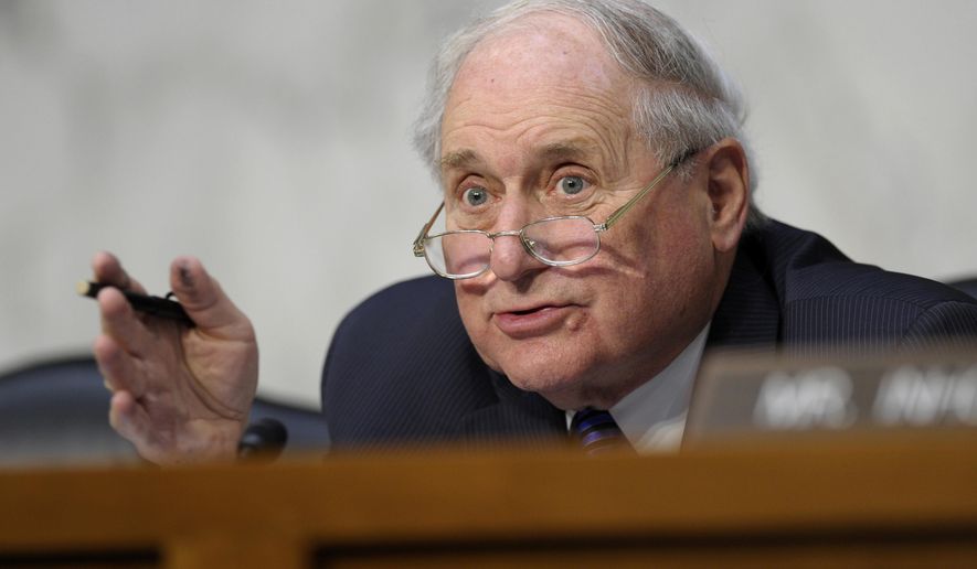 FILE - In this June 4, 2013, file photo, Sen. Carl Levin, D-Mich. speaks on Capitol Hill in Washington.  Executives from manufacturing giant Caterpillar Inc. are heading to Capitol Hill to explain what one senator calls an aggressive strategy to avoid paying billions of dollars in U.S. taxes. Caterpillar has avoided paying $2.4 billion in U.S. taxes since 2000 by shifting profits to a wholly-controlled affiliate in Switzerland, according to a report released by Levin. Levin chairs the Senate investigations subcommittee. His subcommittee is holding a hearing on the report Tuesday. Representatives from Caterpillar and accounting firm PricewaterhouseCoopers LLP are scheduled to testify. (AP Photo/Susan Walsh, File)