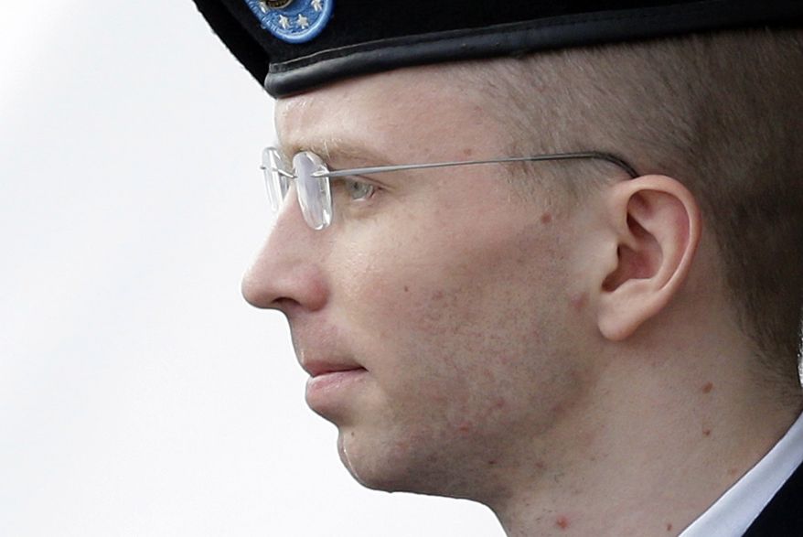 FILE - In this Tuesday, Aug. 20, 2013, file photo, Army Pfc. Bradley Manning, who now wishes to be known as Chelsea Manning, is escorted to a security vehicle outside a courthouse in Fort Meade, Md., after a hearing in his court-martial. The lawyer representing Chelsea Manning in her appeals says the soldier’s 35-year sentence for leaking classified information is out of proportion with her offenses. (AP Photo/Patrick Semansky, File)