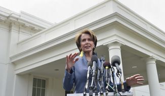 House Minority Leader Nancy Pelosi of Calif. speaks to reporters outside the West Wing of the White House in Washington, Tuesday, April 1, 2014, following her lunch with President Barack Obama. Pelosi was asked several questions about the Affordable Care Act. (AP Photo/Susan Walsh)