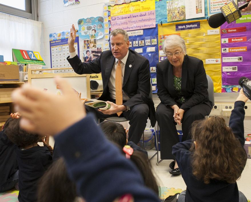 New York City Mayor Bill de Blasio,left, and NYC Schools Chancellor Carmen Farina visit a pre-kindergarten classroom at Police Officer Ramon Suarez School in the Queens borough of New York, Wednesday, April 2, 2014. The school will be among those which will offer full-day pre-K in the fall of 2014. (AP Photo/The Wall Street Journal, Andrew Hinderaker, Pool)