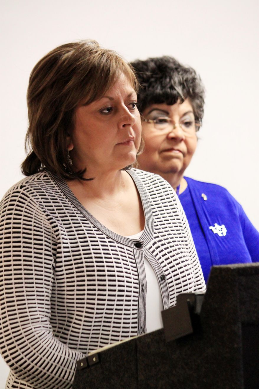 New Mexico Gov. Susana Martinez, left, answer questions about a series of initiatives aimed at improving New Mexico's child welfare system during a news conference in Albuquerque, N.M. on Wednesday, April 2, 2014. Looking on is Children, Youth and Families Secretary Yolanda Deines. (AP Photo/Susan Montoya Bryan)