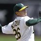 Oakland Athletics&#39; Scott Kazmir works against the Cleveland Indians in the first inning of a baseball game on Wednesday, April 2, 2014, in Oakland, Calif. (AP Photo/Ben Margot)