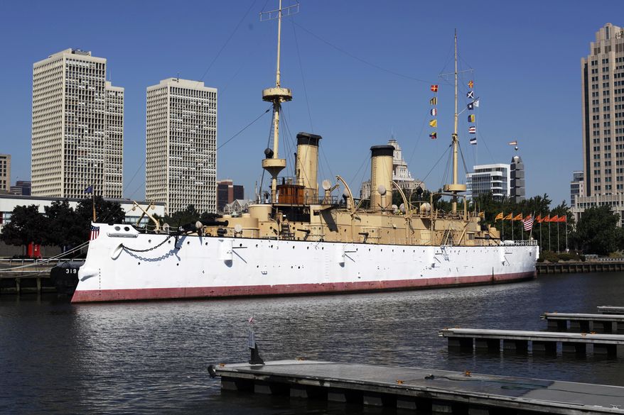 FILE - This Aug. 30, 2010 file photo shows the USS Olympia, which served as flagship of the Asiatic Squadron in the Spanish-American War, in Philadelphia. Caretakers for the historic steel cruiser say they've ended an effort to find another home for the ship and they're keeping it in Philadelphia. (AP Photo/Matt Rourke, File)