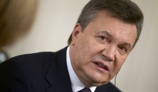 Ousted Ukrainian President Viktor Yanukovych speaks during the interview with The Associated Press, in Rostov-on-Don, Russia, on Wednesday, April 2, 2014. (AP Photo/Ivan Sekretarev)