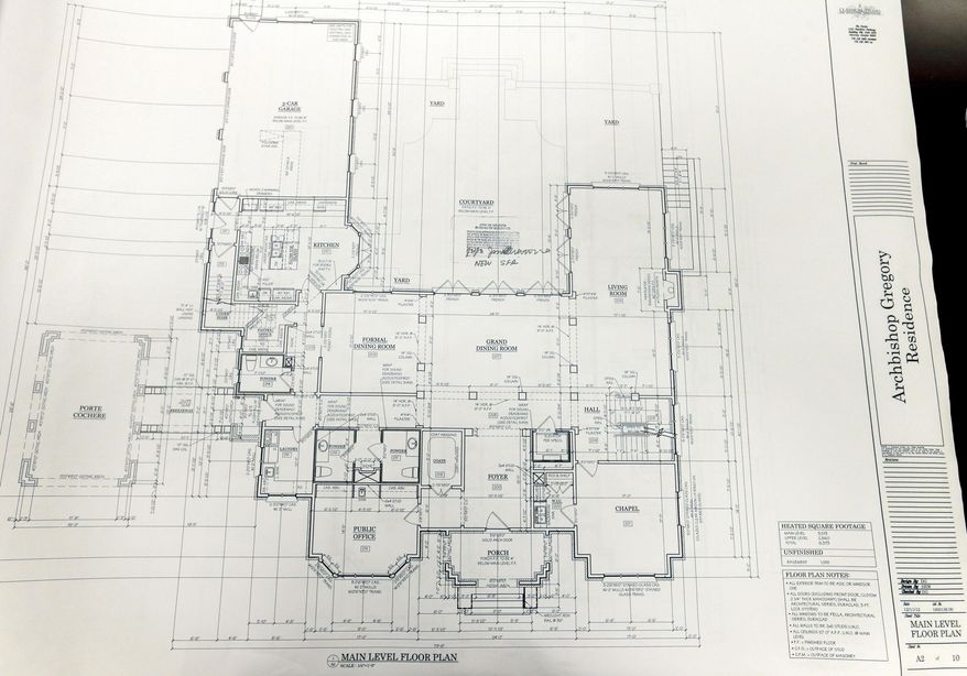 An original floor plan for the proposed new residence of Atlanta Archbishop Wilton Gregory is displayed, Wednesday, April 2, 2014, in Smyrna, Ga. The Roman Catholic Archbishop of Atlanta says he suspects the church will ultimately sell a $2.2 million mansion built for his use. Gregory said in an interview with The Associated Press on Wednesday that he accepts blame for not consulting enough with members of the church before building the expansive residence in one of Atlanta's toniest neighborhoods. (AP Photo/David Goldman)