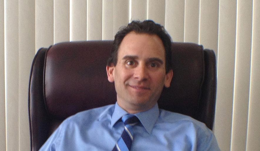 In this February 2013 file photo, Putnam County District Attorney Adam Levy poses for a photo at his Carmel, N.Y., office. Alexandru Hossu, a close friend of Levy, the son of TV's Judge Judy, has been acquitted of child rape. Levy recused himself from the case, saying Hossu was a close friend and frequent houseguest. But he helped pay for Hossu's defense and the county sheriff claimed Levy had interfered with the prosecution. The prosecutor on the case also complained to the judge. (AP Photo/The Journal News, Terry Corcoran, File) NYC OUT; NO SALES; ONLINE OUT; MAGS OUT