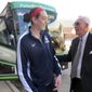 Former Connecticut men&#39;s basketball coach Dee Rowe, right, wishes forward Breanna Stewart luck Thursday, April 3, 2012 in Storrs, Conn., as she prepares to board the team bus to the airport for a flight to the Women&#39;s NCAA Final Four in Nashville. (AP Photo/Pat Eaton-Robb)
