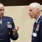 U.S. Air Force Gen. Philip Breedlove, left, the Supreme Allied Commander in Europe, speaks to colleagues during a meeting of the North Atlantic Council with Non-NATO ISAF Contributing Nations at NATO headquarters in Brussels on Wednesday, April 2, 2014. (AP Photo/Virginia Mayo)