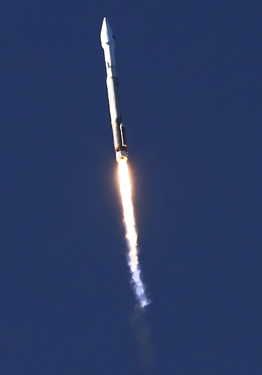 An Atlas 5 rocket launches from Vandenberg Air Force Base from Space Launch Complex-3 on Thursday, April 3, 2014. A United Launch Alliance Atlas V rocket carrying the 19th Defense Meteorological Satellite Program spacecraft blasted off at 7:46 a.m. PDT and quickly rose into the cold, clear sky above the launch site on the Pacific coast about 130 miles northwest of Los Angeles. The satellite will circle the Earth in a polar orbit at an altitude of about 525 miles (847 kilometers). (AP Photo/The Santa Maria Times, Daniel Dreifuss)