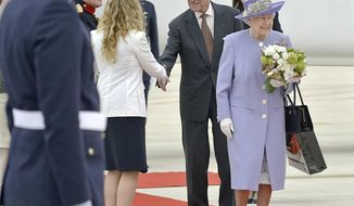 Queen Elizabeth II, accompanied by Prince Philip arrives at Rome&#39;s Ciampino military airport to start their one-day visit to Italy and the Vatican, Thursday, April 3, 2014. The British Royals will meet Italian President Giorgio Napolitano during an official lunch at the Quirinale Presidential Palace and Pope Francis at the Vatican in the afternoon. (AP Photo/Daniele Leone) Photo LaPresse 04-03-2014 Rome (Italy) News Queen Elizabeth and Prince Philip arrive at Ciampino airport