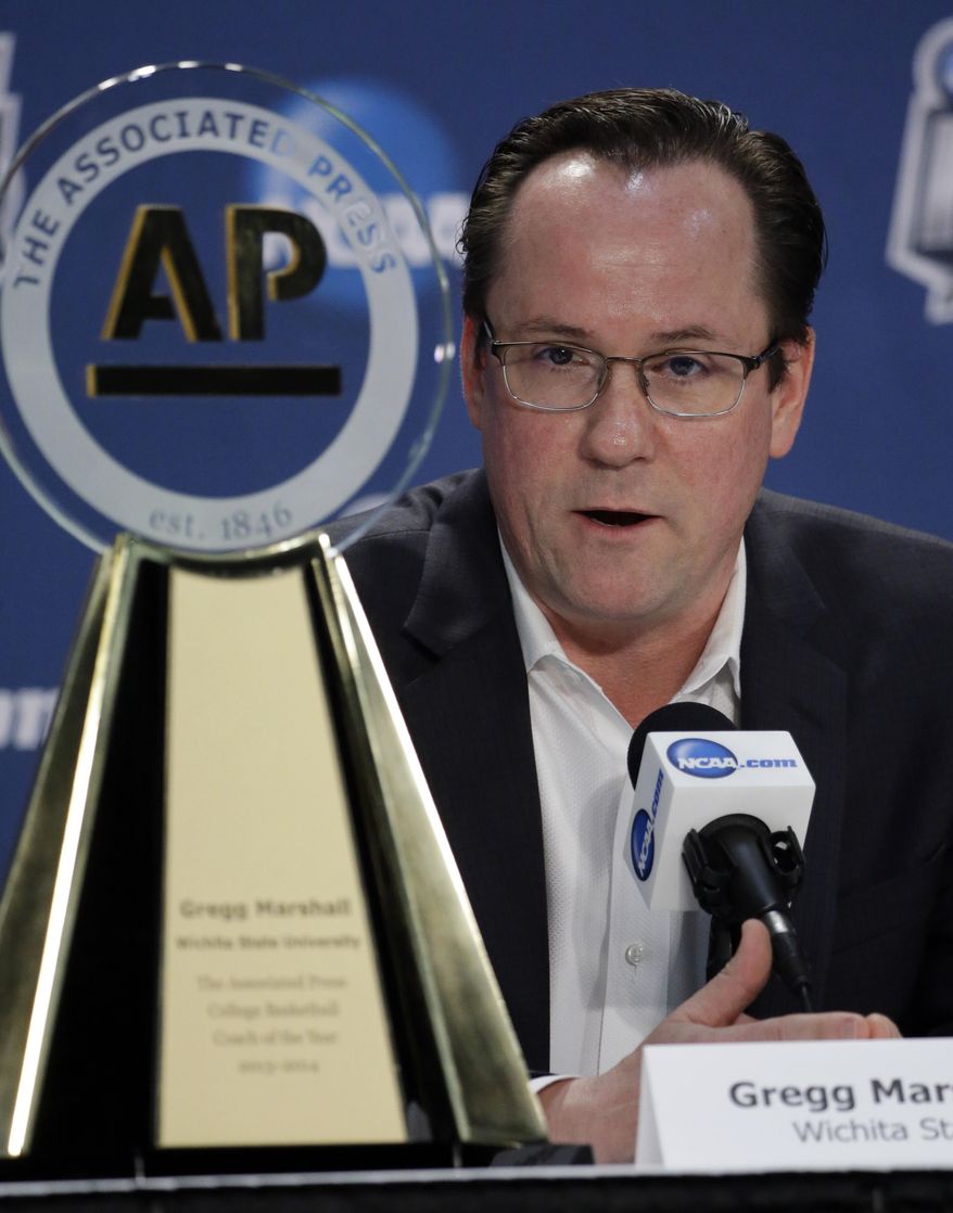 Wichita State's head coach Gregg Marshall speaks at a news conference Thursday, April 3, 2014, in Dallas. Marshall was named the AP College Basketball Coach of the Year. (AP Photo/David J. Phillip)