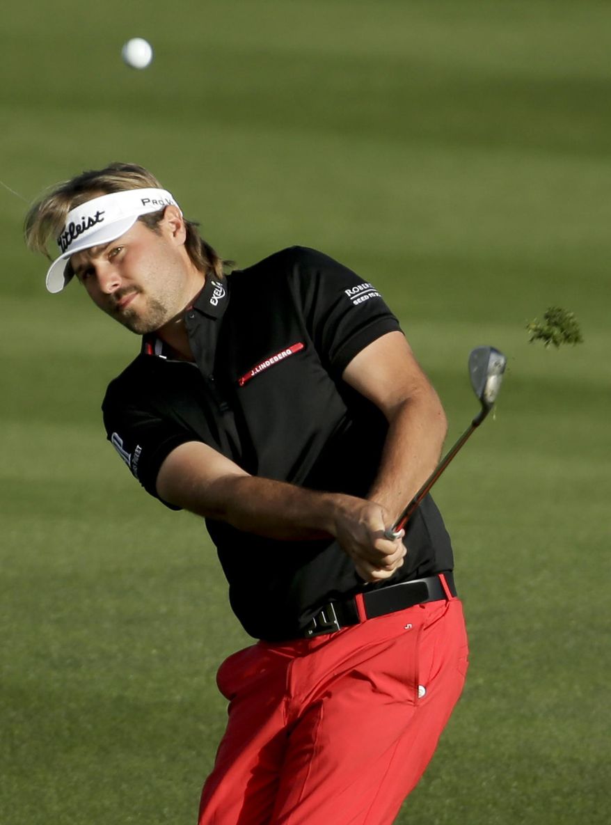 ADVANCE FOR WEEKEND EDITIONS, APRIL 5-6 - FILE - In this Feb. 25, 2014, file phot, Victor Dubuisson, of France, hits out from the fairway on the eighth hole during his match against Ernie Els, of South Africa, in the fifth round of the Match Play Championship golf tournament in Marana, Ariz. The rookie class at Augusta National might be the strongest ever the Masters, from Jordan Spieth and Patrick Reed to Victor Dubuisson and Jimmy Walker. (AP Photo/Chris Carlson, File)