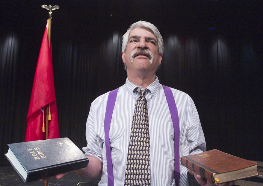 This photo taken March 25, 2014, shows attorney Jim Buttrey portraying attorney Henry Drummond in the Community Theatre of Howell's production of "Inherit the Wind," at Howell High School Freshman Campus theater. (AP Photo / Livingston County Daily Press & Argus, Gillis Benedict)