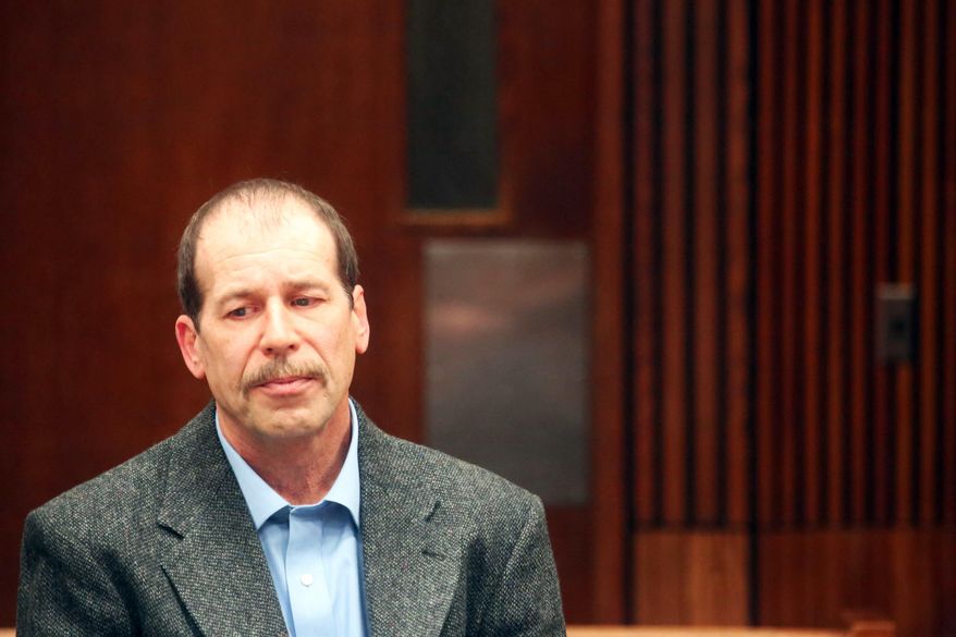 Theodore Wafer appears in court while Wayne County Court judge Quiana Lillard denied a motion to remove herself from a case involving Wafer of Dearborn Heights who fatally shot an unarmed woman on his porch, on Friday, April 4, 2014 in Detroit. Lillard rejected the motion filed by Wafer's attorneys, who argued that her previous employment with the prosecutor's office and associations with employees create an appearance of impropriety. Lillard was a prosecutor for more than eight years before Gov. Rick Snyder appointed her to the bench last August. Wafer is charged with second-degree murder after shooting Renisha McBride, 19, at his Dearborn Heights home. He said he believed McBride wanted to break in. Prosecutors say Wafer should have kept the door shut and called police instead of shooting. McBride was drunk and in a car crash three hours earlier. (AP Photo/Detroit Free Press, Regina H. Boone) DETROIT NEWS OUT; NO SALES