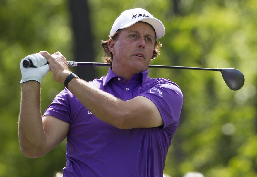Phil Mickelson tees off on the 12th hole during the second round of the Houston Open golf tournament on Friday, April 4, 2014, in Humble, Texas. (AP Photo/Patric Schneider)