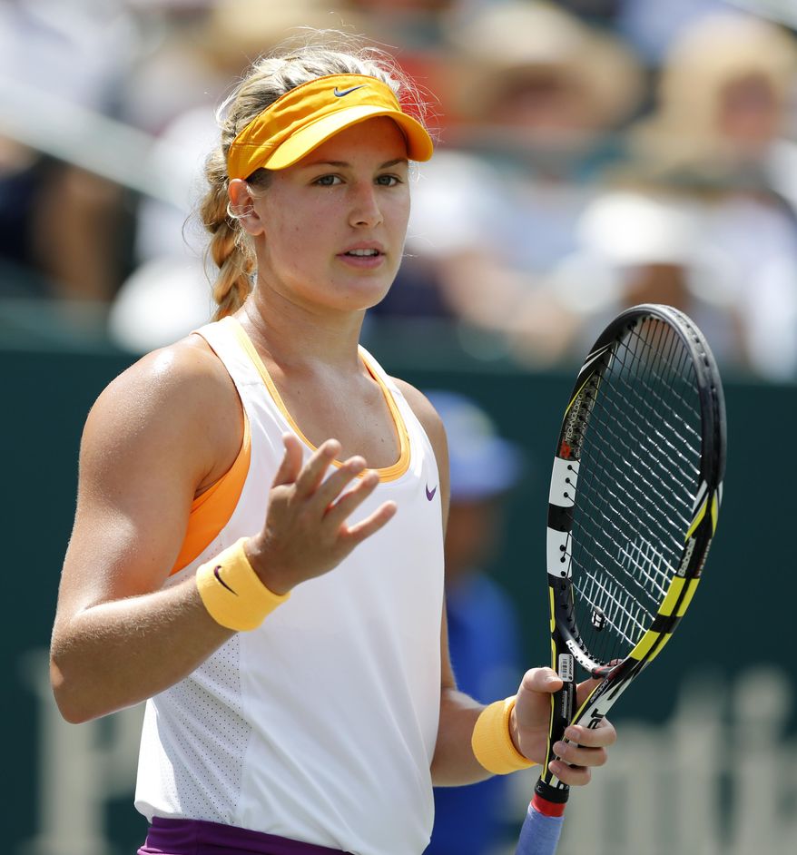Eugenie Bouchard, of Canada, gestures during her match against Jelena Jankovic, of Serbia, during the Family Circle Cup tennis tournament in Charleston, S.C., Friday, April 4, 2014. (AP Photo/Mic Smith)