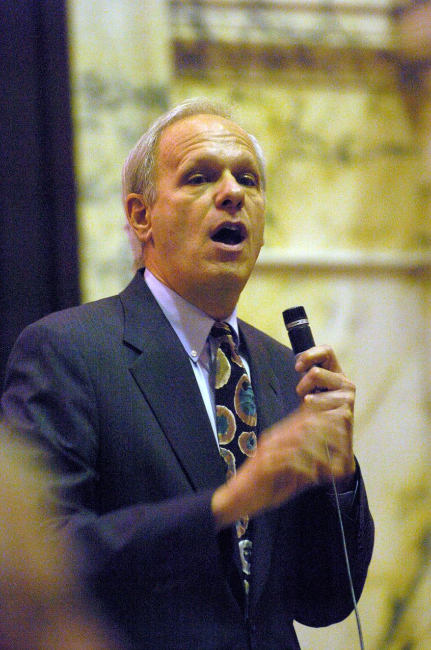 State Sen. Paul Pinsky, (D-Prince George's Co.) expresses his support on the floor of the Senate for an override of Gov. Robert Ehrlich's veto of the medical malpractice bill Tuesday, Jan. 11, 2005, in Annapolis, Md.. (AP Photo/Gail Burton)