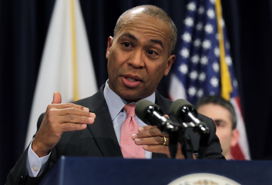 ** FILE ** In this Jan. 22, 2014, file photo, Mass. Gov. Deval Patrick gestures during a news conference at the Statehouse in Boston. (AP Photo/Charles Krupa, File)