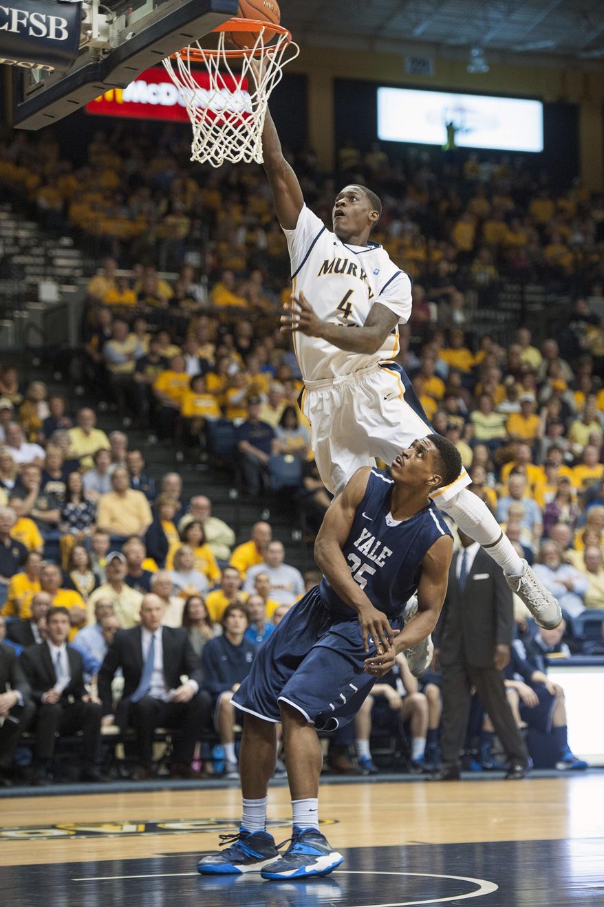 Murray State's Jarvis Williams puts a shot up over Yale's Brandon Sherrod in an NCAA college basketball game for the CollegeInsider.com tournament championship, Thursday, April 4, 2014, in Murray, Ky. (AP Photo/The Ledger, Kyser Lough)