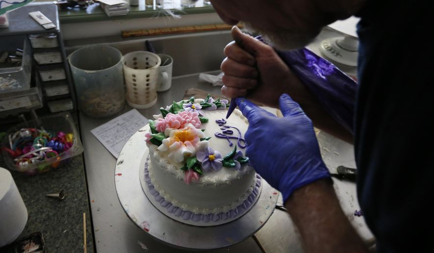 Masterpiece Cakeshop baker Jack Phillips is again at the center of a civil rights fight after refusing to bake a cake for a same-sex wedding. Chris Sevier says Mr. Phillips must be compelled to make cakes for him and his computer "bride." (Associated Press/File)