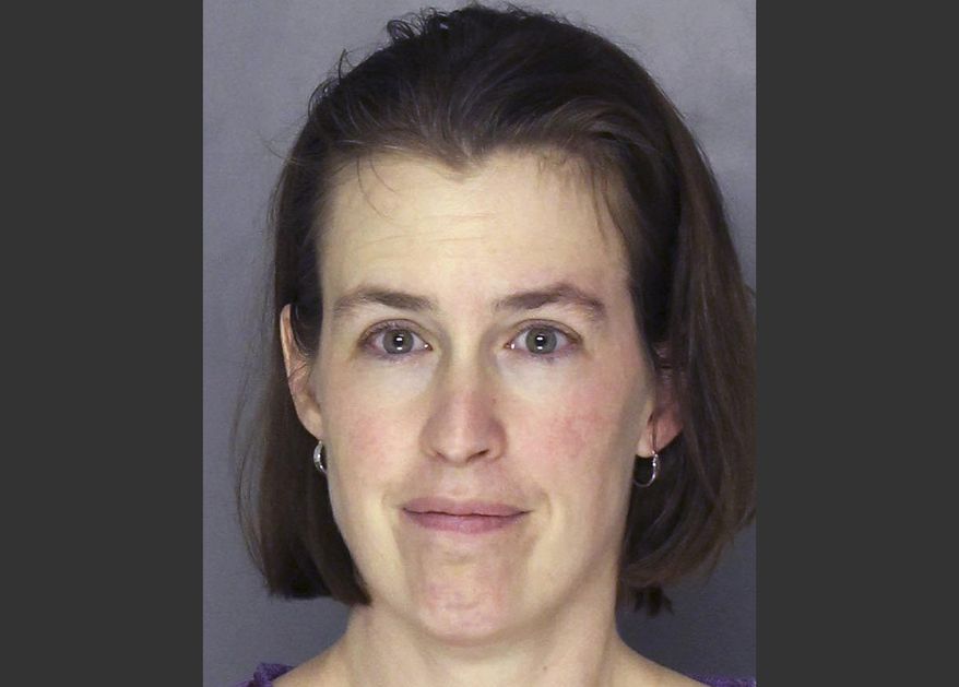 FILE - This Tuesday, April 1, 2014 file booking photograph released by the Allegheny County Police shows Laurel Michelle Schlemmer, who is charged with drowning her 3-year-old son and leaving his 6-year-old brother in critical condition Tuesday, April 1 after she allegedly pushed the boys underwater in a bathtub, then sat on them at their McCandless, Pa. home. Daniel Schlemmer, 6, has died, four days after his younger brother drowned, the Allegheny County Medical Examiner's Office confirmed Saturday, April 5, 2014. (AP Photo/Allegheny County Police, File)