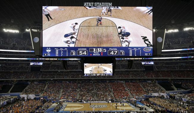 Connecticut guard Shabazz Napier takes a foul shot against Florida during the second half of the NCAA Final Four tournament college basketball semifinal game Saturday, April 5, 2014, in Arlington, Texas. Connecticut won 63-53. (AP Photo/Tony Gutierrez)