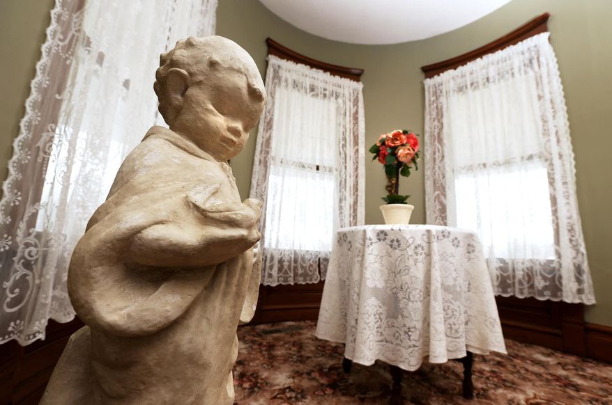 Significant plaster work had to be done inside the Grand Island Woman's Club's Hargis House mansion before painting some areas like the turret area, seen here on April 1, 2014. The mansion in Grand Island, Neb., recently had the main floor painted green and the window treatments updated with 46 panels of new lace curtains. (AP Photos/The Grand Island Independent/Barrett Stinson)
