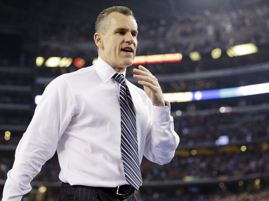 Florida head coach Billy Donovan leaves the floor after his team lost to Connecticut at their NCAA Final Four tournament college basketball semifinal game Saturday, April 5, 2014, in Arlington, Texas. Connecticut won 63-53. (AP Photo/Eric Gay)