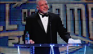 The Ultimate Warrior speaks during the WWE Hall of Fame Induction at the Smoothie King Center in New Orleans on Saturday, April 5, 2014. (Jonathan Bachman/AP Images for WWE)
