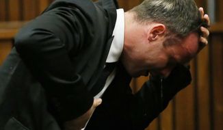 Oscar Pistorius weeps as he listens to evidence by a pathologist in court in Pretoria, South Africa, Monday, April 7, 2014. Pistorius is charged with murder  for the shooting death of his girlfriend Reeva Steenkamp, on Valentines Day 2013. (AP Photo/Themba Hadebe, Pool)