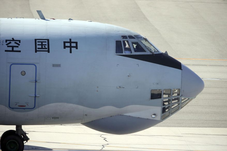 A Chinese Ilyushin IL-76s aircraft taxies along the tarmac at Perth International Airport after returning from search operations for wreckage and debris of the missing Malaysia Airlines Flight MH370 in Perth, Australia, Monday, April 7, 2014. It’s not a question most governments involved in the hunt for Flight 370 care to answer: How much has the far-flung, month-long search cost? Several Chinese ships and planes have been involved in the search, but China’s foreign ministry did not respond to questions about the expense of the effort. (AP Photo/Rob Griffith)