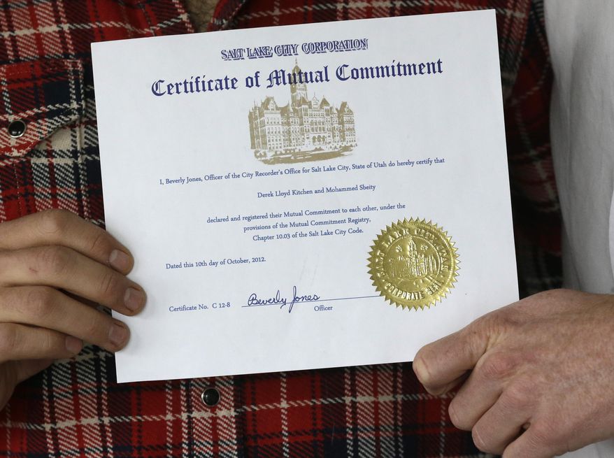In this April 3, 2014, photo, Derek Kitchen, right, and Moudi Sbeity hold their certificate of mutual commitment at their home, in Salt Lake City. The young couple that has become the face of gay marriage in Utah is an unlikely pair for the role. Kitchen and Sbeity were both raised in conservative religious families that shun gays, Kitchen in a Mormon home in Utah and Sbeity in a Muslim family in Lebanon. They each came out when they were 16 years old, worlds apart, and met six years later in college in Utah. They chose to become one of three couples as plaintiffs in the lawsuit challenging Utah’s same-sex marriage to publicly push back against religions that oppress gays and lesbians. (AP Photo/Rick Bowmer)