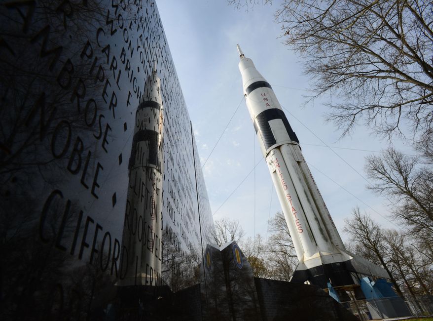 This April 2, 2014 photo shows the Saturn 1B Rocket at the Alabama Welcome Center on Interstate 65 on April 2, 2014 in Ardmore, Ala. The paint is faded, and black mold and algae cover the bottom. Birds use the rocket's crevices for nests, and their droppings are everywhere. The U.S. Space and Rocket Center in Huntsville is working with the Alabama Department of Transportation to get it pressure-washed and painted this summer. The state Tourism Department will fund the project. (AP Photo/The Decatur Daily, Gary Cosby Jr.)