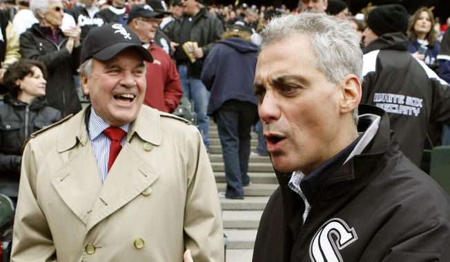 FILE - In this April 7, 2011 file photo, Chicago Mayor Richard M. Daley, left, and Mayor-elect Rahm Emanuel share a moment at a Chicago White Sox game at U.S. Cellular Field in Chicago. Emanuel, the hard-charging mayor is intent on fixing what ails the nation’s third-largest city. Emanuel once nicknamed “Rahmbo” for his fierce political maneuvering, last week announced an agreement with several unions to help bail out the nation’s worst-funded city pension systems, a festering problem he inherited from Daley. Emanuel said the deal, which would slice Chicago’s nearly $20 billion shortfall in half by cutting benefits and raising property taxes, would keep the funds from insolvency and avoid massive cuts in services and a record tax hike. (AP Photo/Charles Rex Arbogast, File)