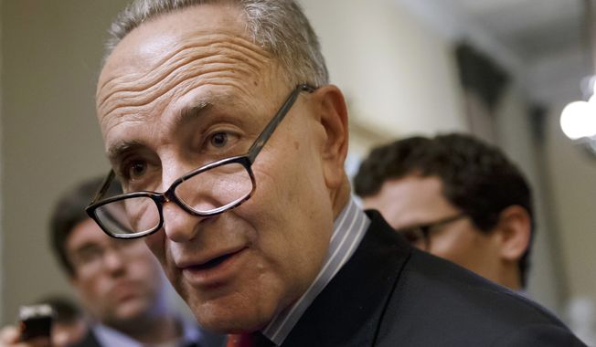 ** FILE ** In this March 26, 2014, file photo, Sen. Charles Schumer, D-N.Y., speaks on Capitol Hill in Washington. (AP Photo/J. Scott Applewhite, File)