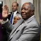FILE - In this  Feb. 7, 2014 file photo, baseball Hall of Famer Hank Aaron waves during a reception in his honor in Washington. The 40th anniversary of Hank Aaron&#39;s 715th home run finds the Hall of Famer, now 80, coping with his recovery from hip surgery. The anniversary of his famous homer on April 8, 1974 will be celebrated before the Braves&#39; home opener against the Mets on Tuesday night. (AP Photo/Nick Wass, File)