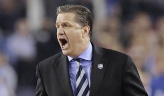 Kentucky head coach John Calipari works the sideline against Connecticut during the second half of the NCAA Final Four tournament college basketball championship game Monday, April 7, 2014, in Arlington, Texas. (AP Photo/Eric Gay)