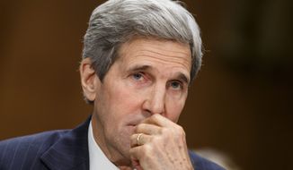 Secretary of State John F. Kerry defends the Obama administration&#x27;s response to Russia&#x27;s moves on eastern Ukraine during a Senate Foreign Relations Committee hearing. (Associated Press Photographs)