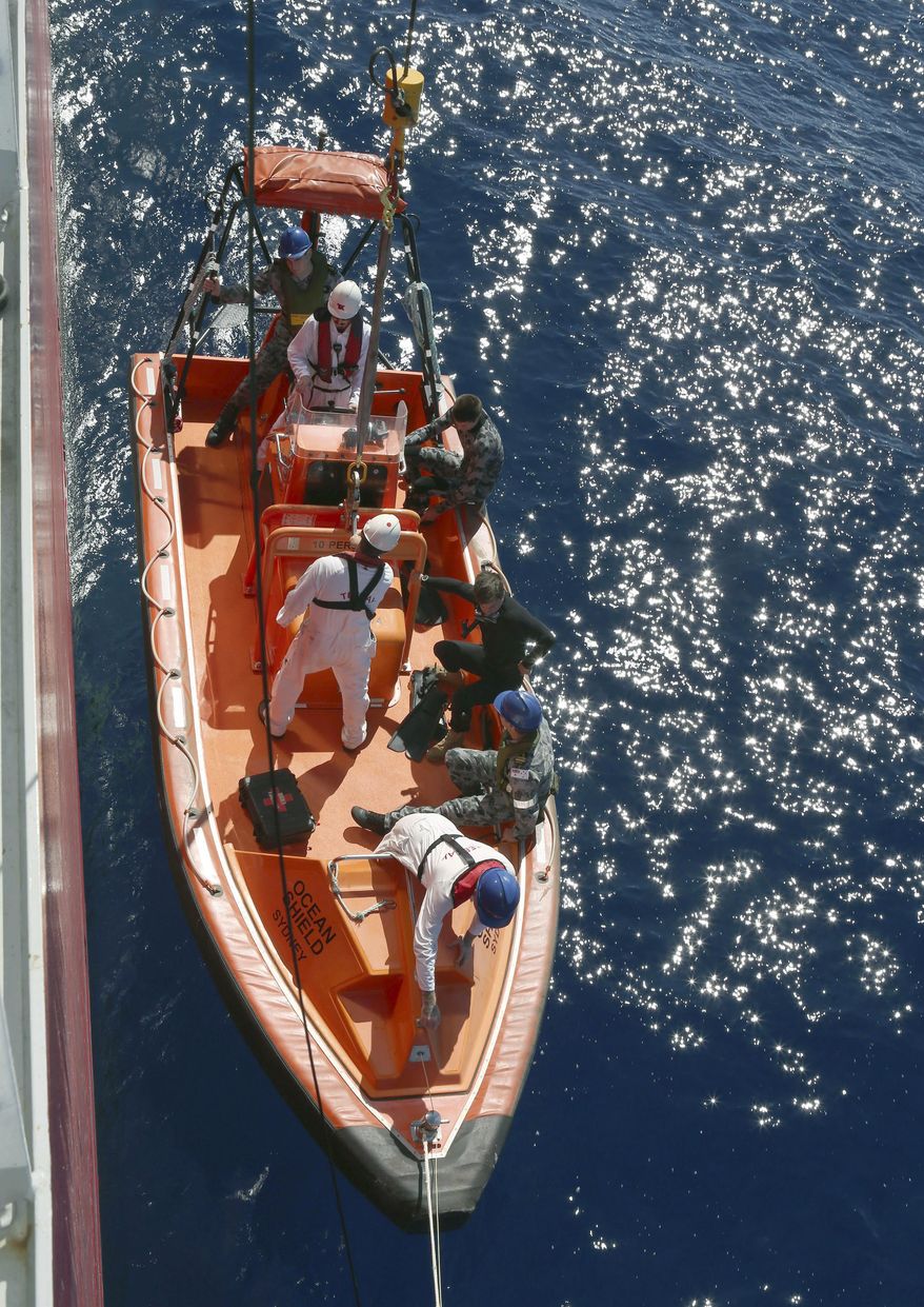 In this April 7, 2014 photo provided by the Australian Defense Force, a fast response craft manned by members of the Australian Defense's ship Ocean Shield is deployed to scan the water for debris of the missing Malaysia Airlines Flight 370 in the southern Indian Ocean. Up to 14 planes and as many ships were focusing on a single search area covering 77, 580 square kilometers (29,954 square miles) of ocean, 2,270 kilometers (1,400 miles) northwest of the Australian west coast city of Perth, Australia. (AP Photo/Australian Defense Force, LSIS Bradley Darvill) EDITORIAL USE ONLY