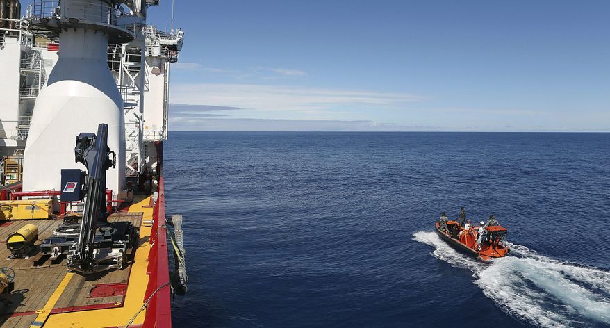 In this April 7, 2014 photo provided by the Australian Defense Force a fast response craft manned by members ofthe Australian Defense's ship Ocean Shield is deployed to scan the water for debris of the missing Malaysia Airlines Flight 370 in the southern Indian Ocean. Up to 14 planes and as many ships were focusing on a single search area covering 77, 580 square kilometers (29,954 square miles) of ocean, 2,270 kilometers (1,400 miles) northwest of the Australian west coast city of Perth, Australia. (AP Photo/Australian Defense Force, LSIS Bradley Darvill) EDITORIAL USE ONLY
