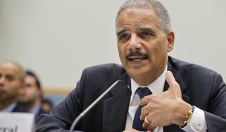 Attorney General Eric Holder testifies on Capitol Hill in Washington, Tuesday, April 8, 2014, before the House Judiciary Committee hearing on the oversight of the Justice Department.  (AP Photo/Manuel Balce Ceneta)