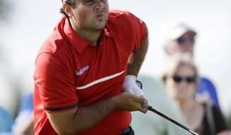FILE - In this March 9, 2014, file photo, Patrick Reed watches his shot on the 11th hole during the final round of the Cadillac Championship golf tournament in Doral, Fla. The rookie class at Augusta National might be the strongest ever at the Masters, from Jordan Spieth and Patrick Reed to Victor Dubuisson and Jimmy Walker. (AP Photo/Wilfredo Lee, File)