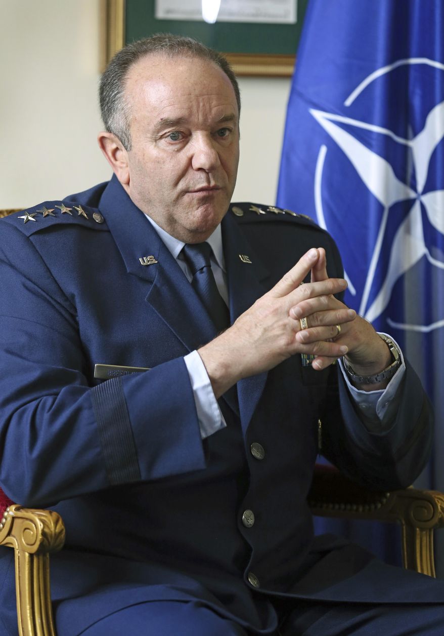 NATO Supreme Allied Commander Europe, U.S. Air Force General Philip Breedlove during an interview with the Associated Press in Paris, Wednesday April 9, 2014, as he talks about his mission to formulate a plan to help protect and reassure NATO members nearest Russia. NATO’s top military commander in Europe, Breedlove is tasked with drafting countermoves to the Russian military threat against Ukraine. (AP Photo/Remy de la Mauviniere)