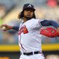 Atlanta Braves starting pitcher Ervin Santana delivers during the first inning of the baseball game against the New York Mets, Wednesday, April 9, 2014, in Atlanta. (AP Photo/Todd Kirkland)
