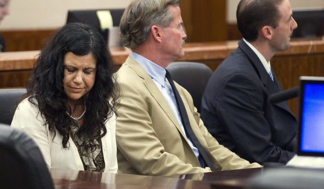 Ana Trujillo reacts after being found guilty of killing her boyfriend, after the jury deliberated less than two hours, on Tuesday, April 8, 2014, in Houston. Trujillo, 45, was found guilty of fatally stabbing her boyfriend with the stiletto heel of her shoe, hitting him at least 25 times in the face. (AP Photo/Houston Chronicle, Brett Coomer)