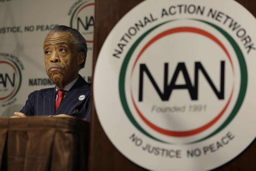 Rev. Al Sharpton listens to speakers during the opening ceremonies for the National Action Network convention in New York, Wednesday, April 9, 2014. The 16th annual convention will run through April 12, 2014. (AP Photo/Seth Wenig)