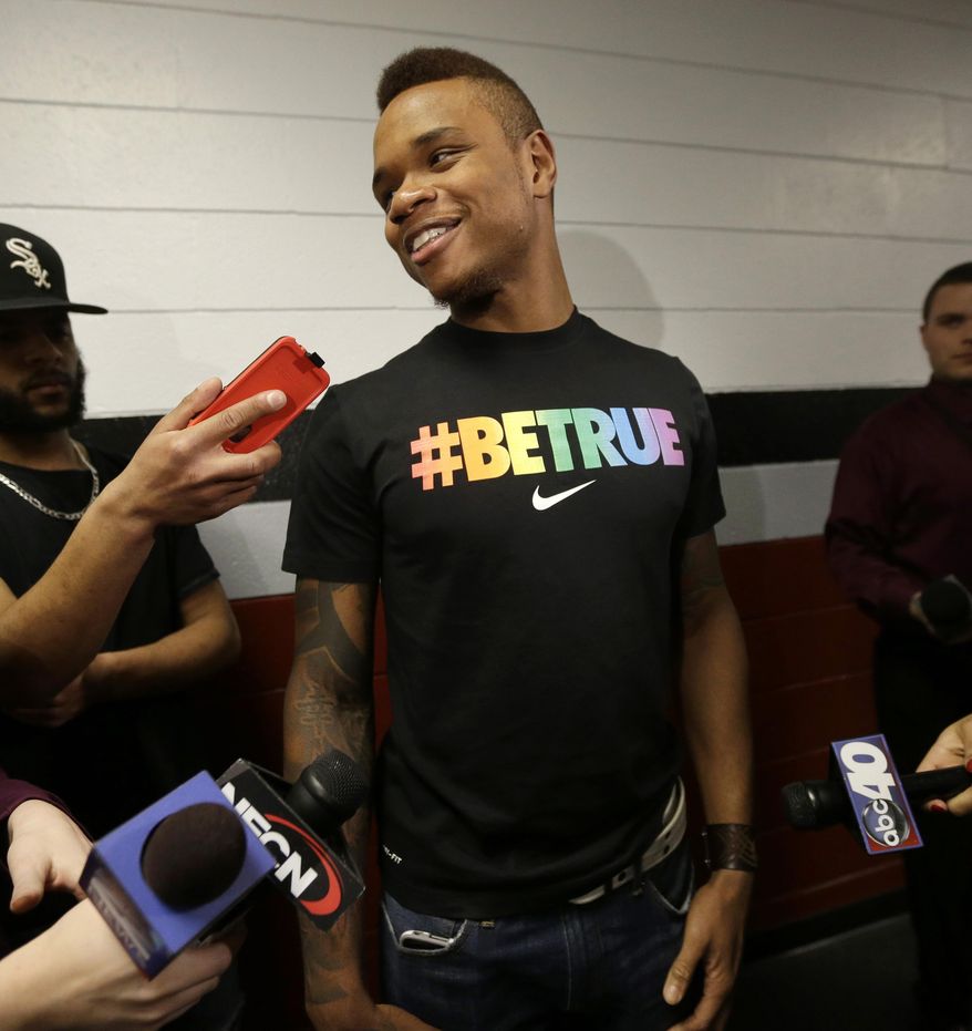 University of Massachusetts basketball guard Derrick Gordon, 22, faces reporters on the school's campus, Wednesday, April 9, 2014, in Amherst, Mass. Gordon has become the first openly gay player in Division I men's basketball. (AP Photo/Steven Senne)